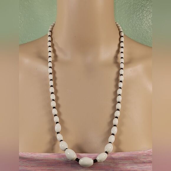 woman white and black necklace - Picture 1 of 5
